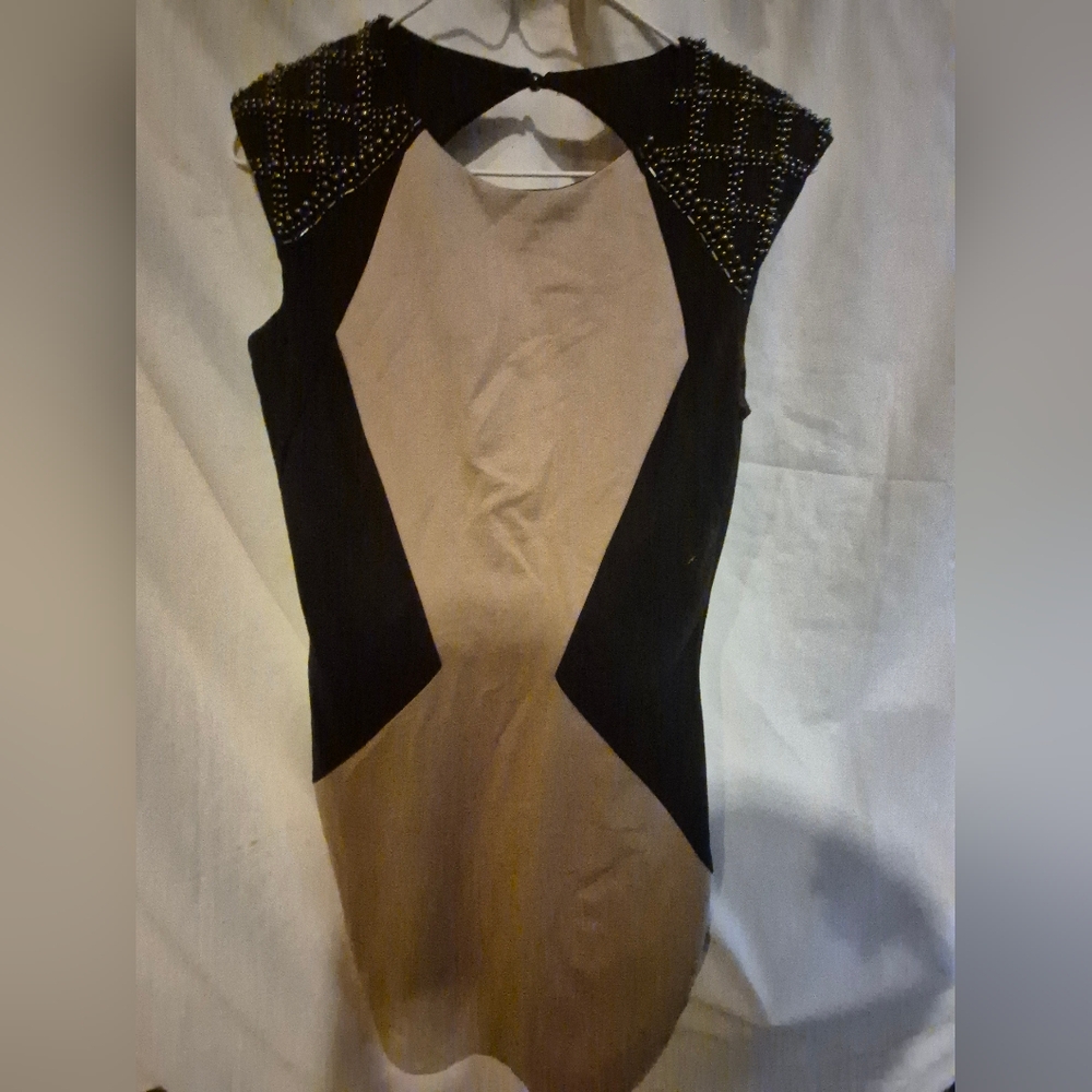 Chic Black and Tan Dress with Studded Shoulders